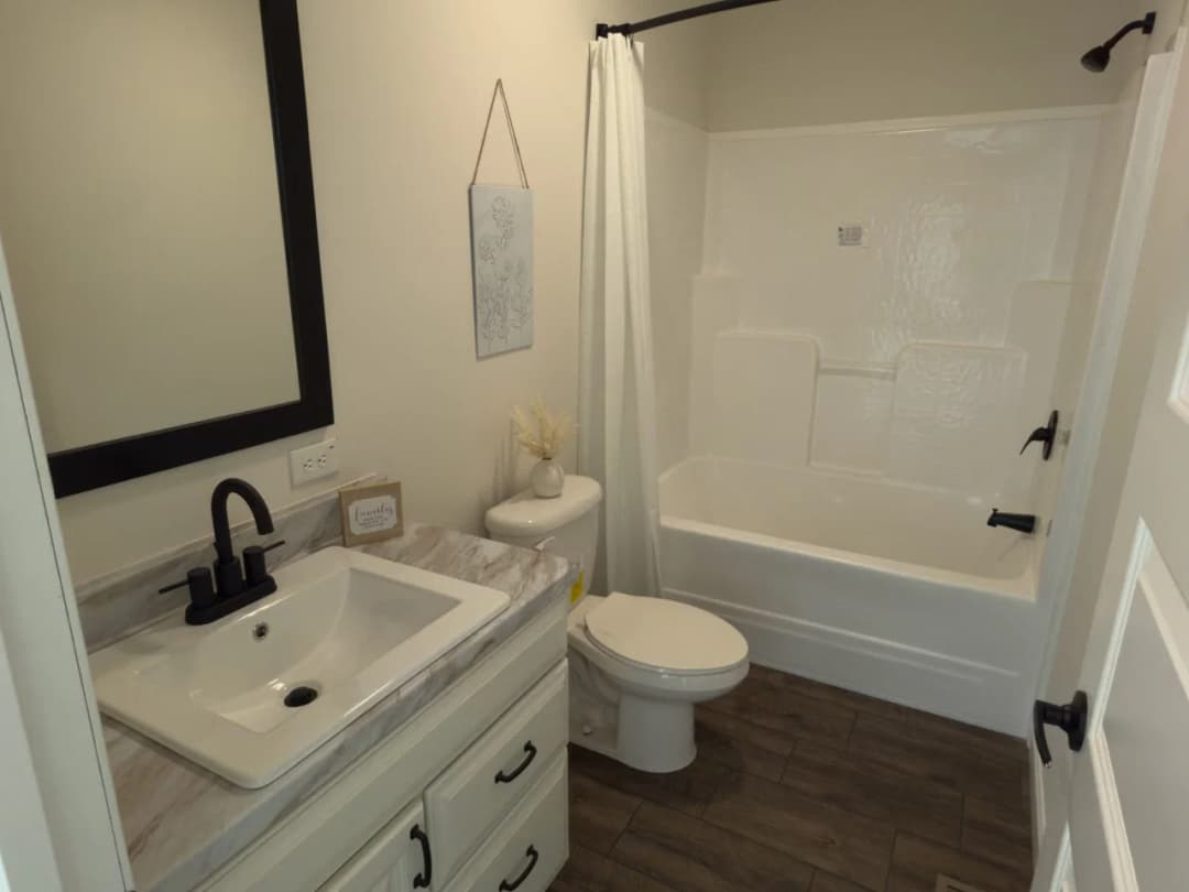 The woodside b bathroom home features