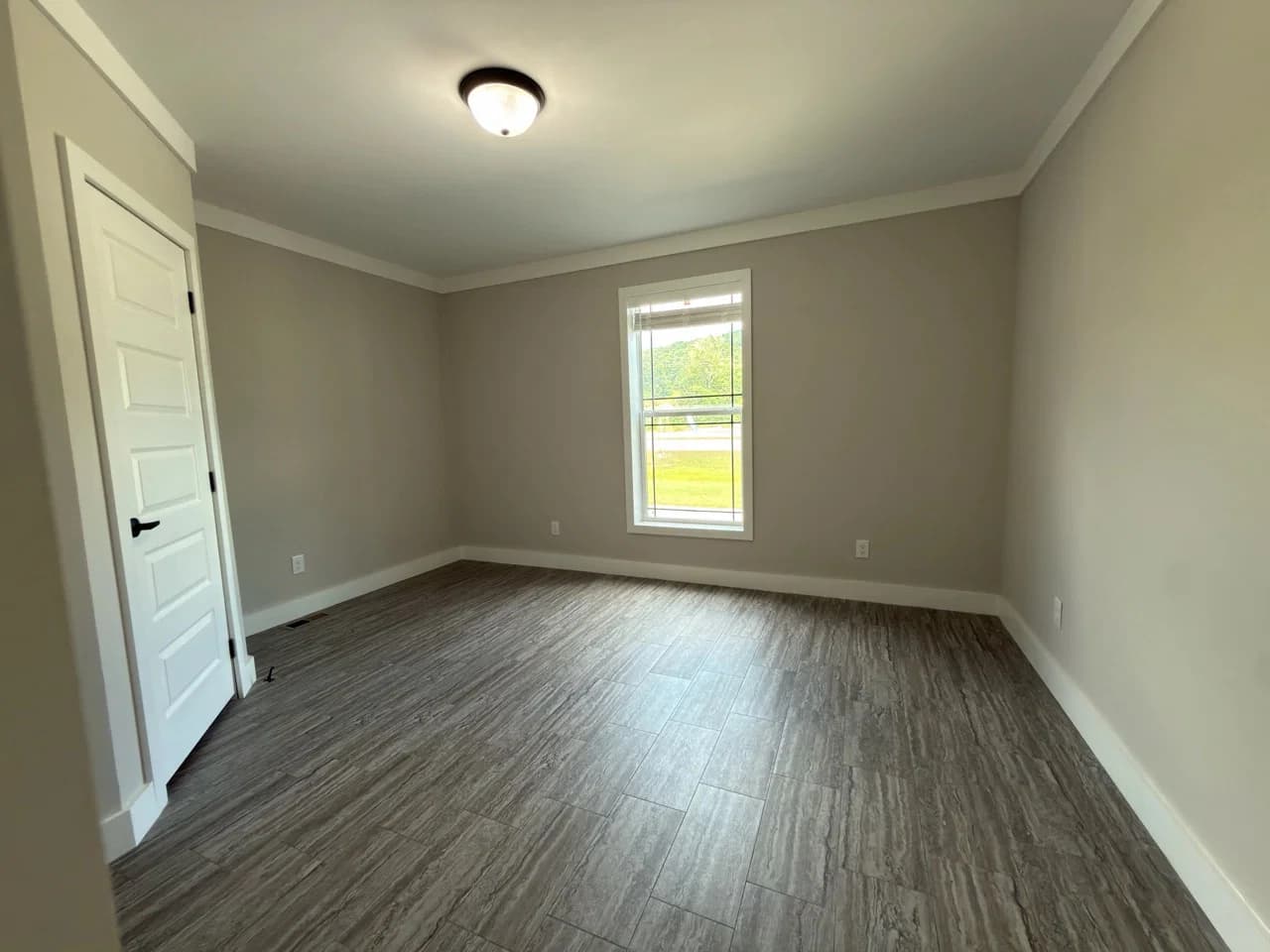 The barndominium bedroom home features