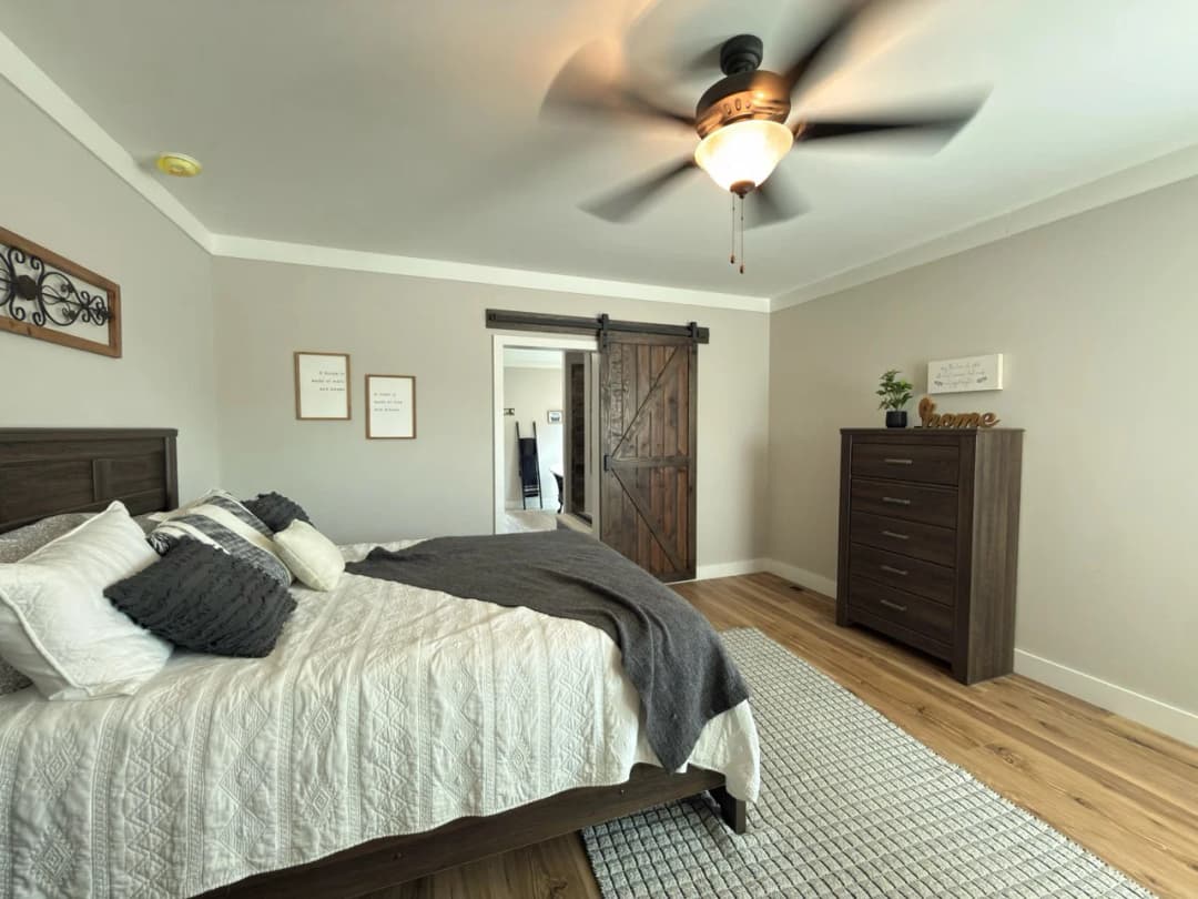 The barndominium bedroom home features